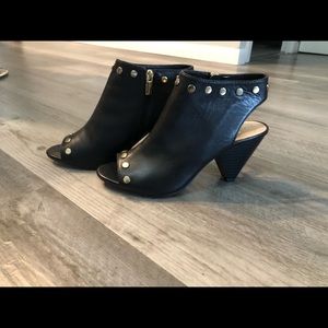 100% leather peep tie heels. Only worn 2x little to no signs of wear